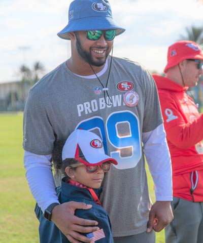 TAPS girl with NFL Player at 2019 NFL Pro Bowl