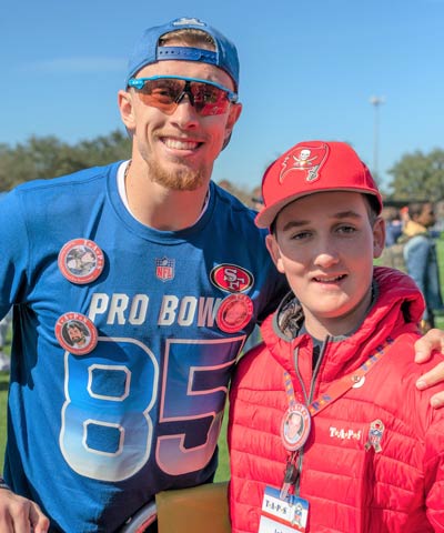 TAPS boy with NFL Player at 2019 NFL Pro Bowl