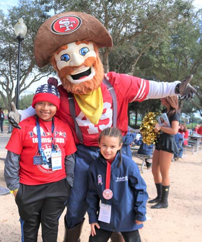 TAPS children with mascot at 2019 NFL Pro Bowl