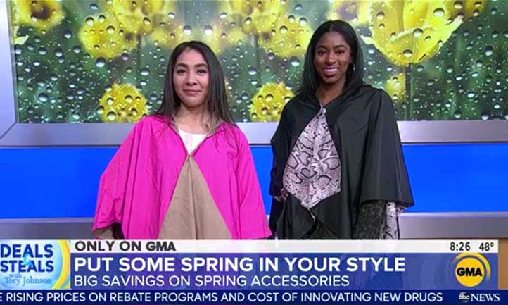 Nichole Baldwin, left, and Jaisha Haynes, right, modeled spring ponchos on a live segment of Good Morning America.