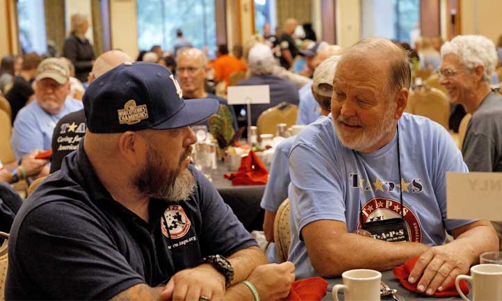 TAPS Surviving Men at Seminar with American Foundation for Suicide Prevention and TAPS Logos