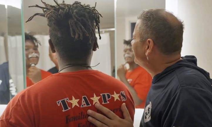 Mark Brickell with TAPS Teen giving shaving lesson