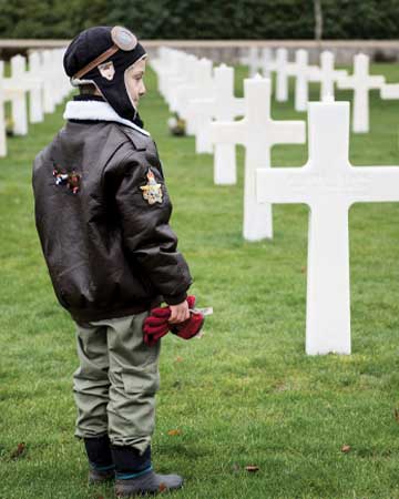 Young boy is World War two pilot gear