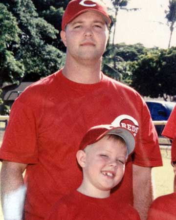 Kyler as a child with his father