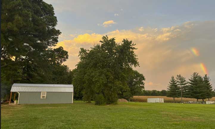 Fall Outside with Rainbow in Sky